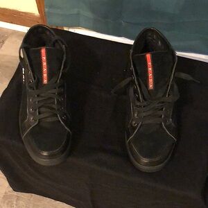 Prada woman’s black high top sneakers